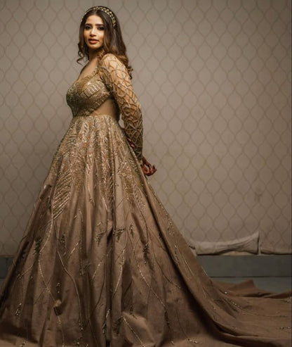 LONG FLOOR LENGTH GOLDEN BALL GOWN